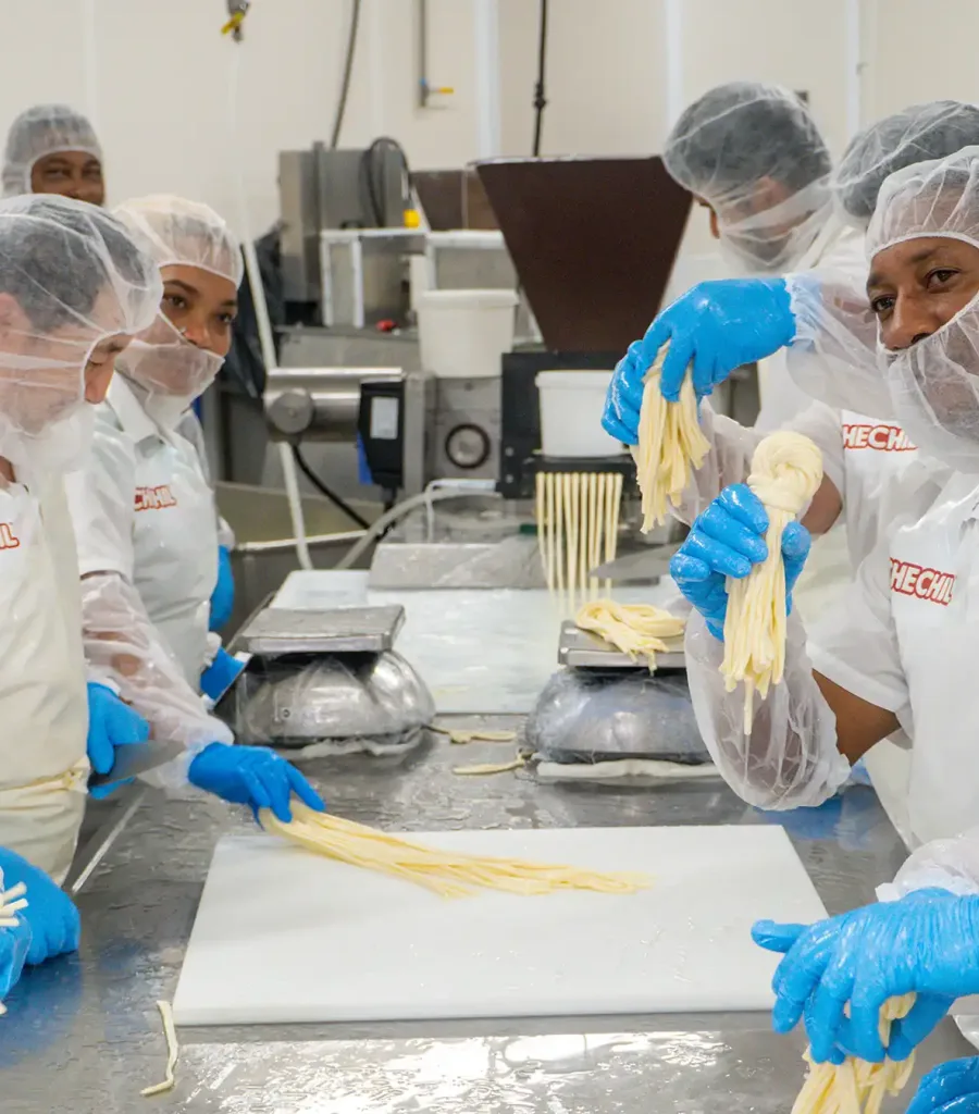 Chechil Team Hand-Braiding String Cheese At Our New York Production Facility
